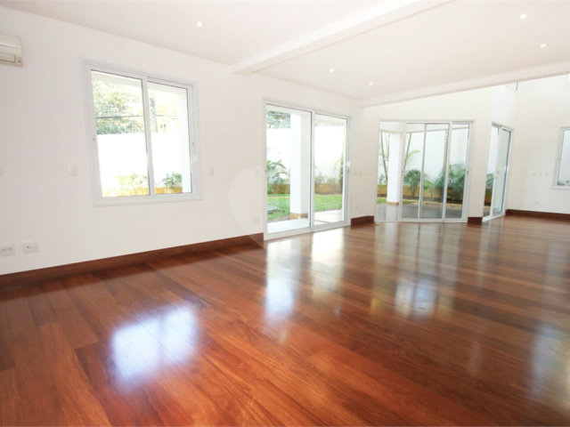 Casa à venda com 4 suítes no condomínio Vila Alba, São Paulo - SP