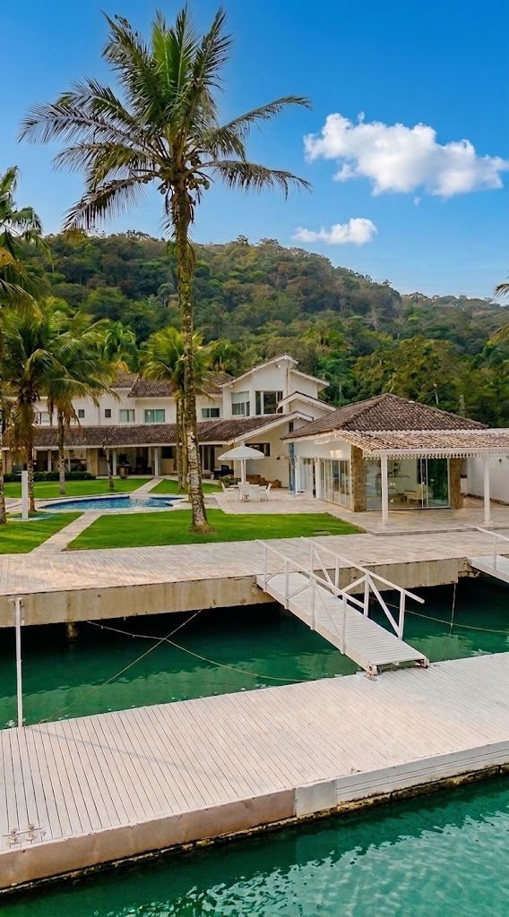 Casa com 5 dormitórios à venda, 900 m² por R$ 15.200.000,00 - Cidade Jardim Tom - Guarujá/SP