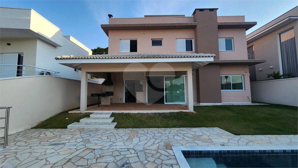 Casa à venda com 4 suítes no condomínio Santa Isabel I, Louveira - SP