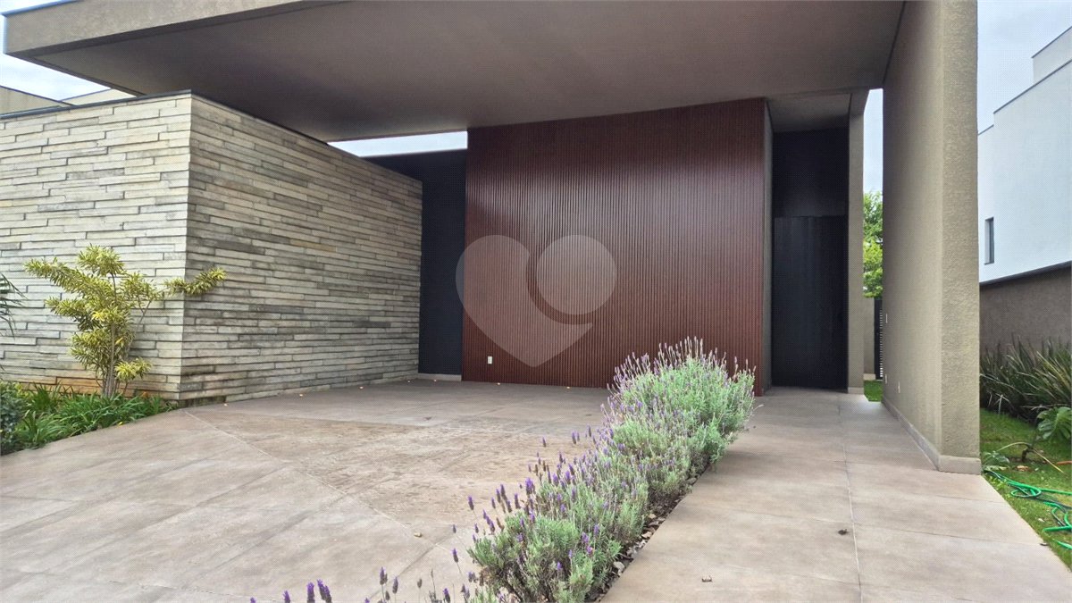 Casa à venda com 4 suítes no condomínio Alphaville Nova Esplanada 1, Votorantim - SP