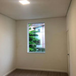 Casa com 3 dormitórios à venda, 116 m² por R$ 690.000,00 - Gonzaga - Santos/SP