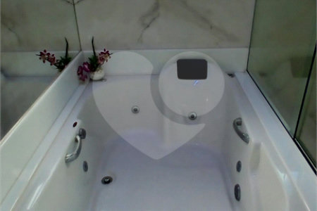 Casa à venda com 3 suítes no condomínio Figueira Garden, Atibaia - SP