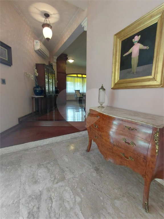 Casa à venda com 4 suítes no condomínio Ville Bourghese, São Paulo - SP