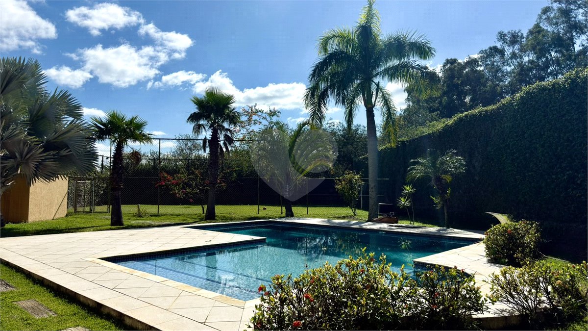 Casa à venda com 4 suítes no condomínio Parque Village Castelo, Itu - SP