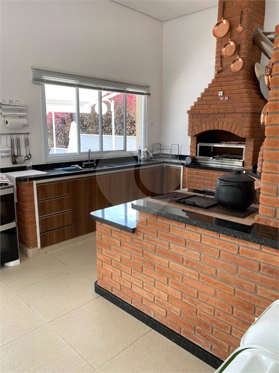 Casa à venda com 4 suítes no condomínio Reserva Ibirapitanga Ii, Santa Isabel - SP