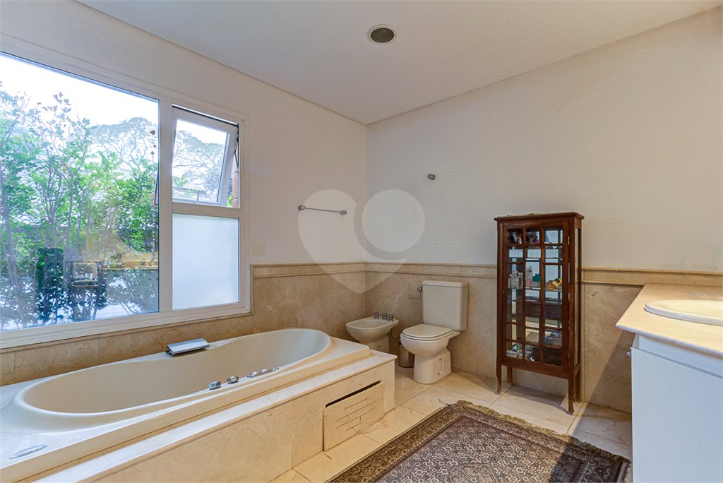 Casa à venda com 4 suítes no condomínio Vila Verde, São Paulo - SP