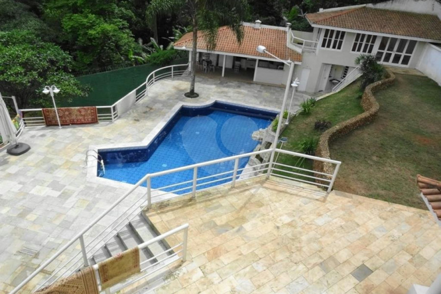 Casa à venda com 4 suítes no condomínio Praça Lagoa dos Patos,38, São Paulo - SP