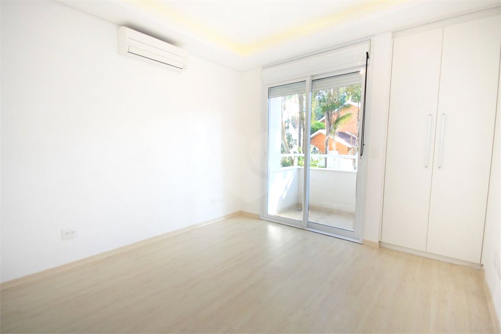 Casa à venda com 4 suítes no condomínio Vila Alba, São Paulo - SP