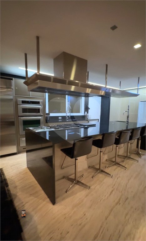 Casa à venda com 4 suítes no condomínio Villaggio Houda, São Paulo - SP