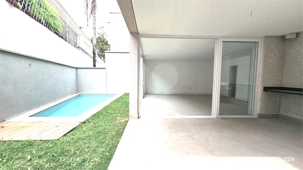 Casa à venda com 4 suítes no condomínio Vila Arese, São Paulo - SP