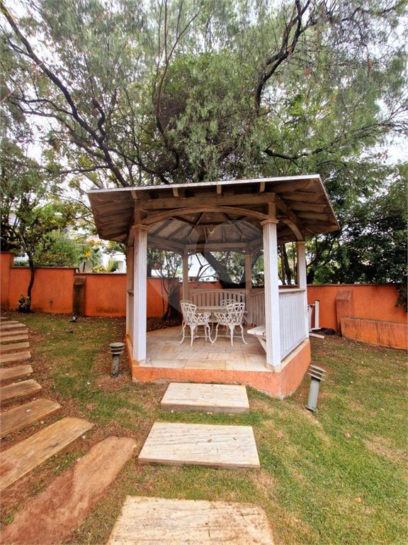 Casa à venda com 4 suítes no condomínio Estância Marambaia, Vinhedo - SP