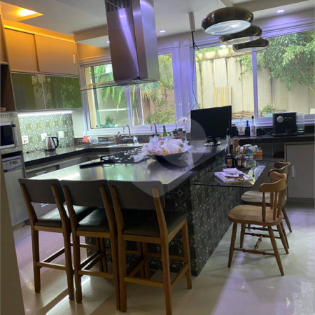 Casa à venda com 4 suítes no condomínio Granja Morumbi, São Paulo - SP