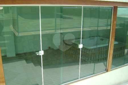 Casa à venda com 3 suítes no condomínio Estância Marambaia, Vinhedo - SP