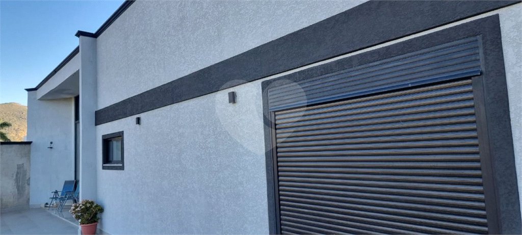 Casa à venda com 4 suítes no condomínio Osato, Atibaia - SP