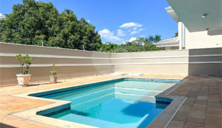Casa à venda com 3 suítes no condomínio Portal do Lago, Valinhos - SP