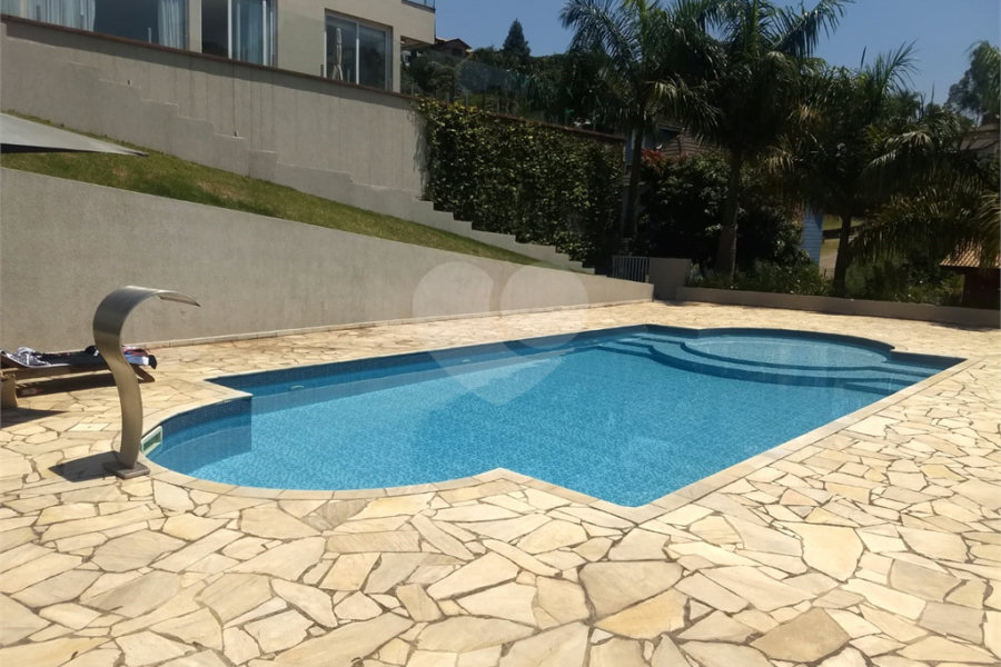 Casa à venda ou para alugar com 4 suítes no condomínio Suíça da Cantareira, Mairiporã - SP