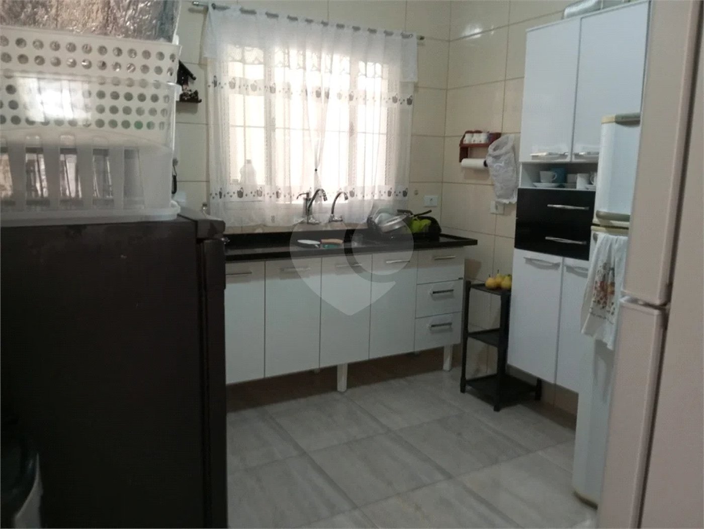 Terreno á venda com 2 casas na Vila Rosália, Guarulhos, SP.