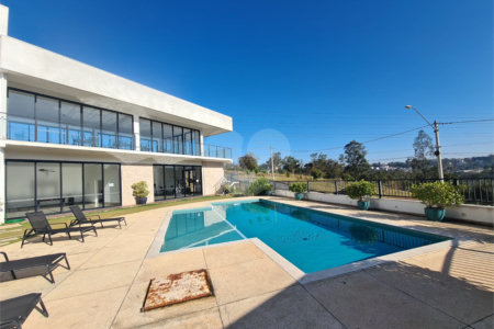 Casa à venda com 3 suítes no condomínio Reserva dos Jatobás, Louveira - SP