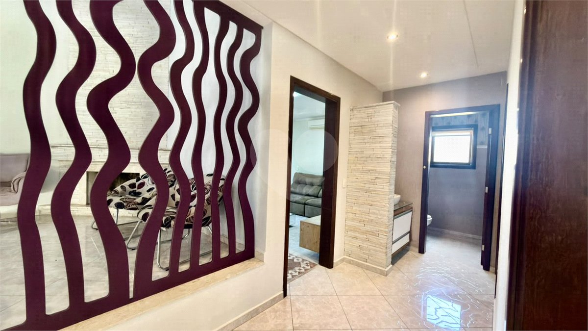 Casa à venda com 4 suítes no condomínio Parque Village Castelo, Itu - SP