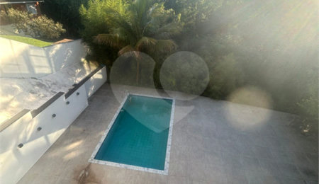 Casa à venda com 4 suítes no condomínio Estância Marambaia, Vinhedo - SP