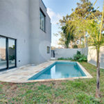 Casa à venda com 4 suítes no condomínio Reserva Robélia, São Paulo - SP
