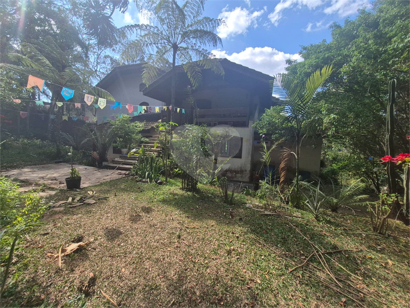 Casa à venda com 3 quartos, sendo 4 suítes, no condomínio Alpes da Cantareira, Mairiporã - SP