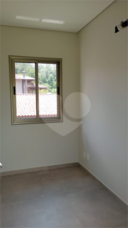 Casa à venda com 4 suítes no condomínio Estância Marambaia, Vinhedo - SP
