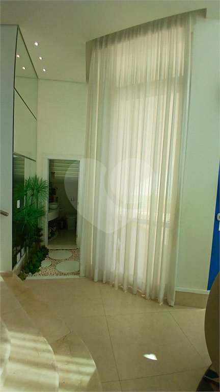 Casa à venda com 3 suítes no condomínio Figueira Garden, Atibaia - SP