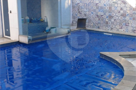 Casa à venda com 4 suítes no condomínio Parque da Figueiras, Mogi das Cruzes - SP