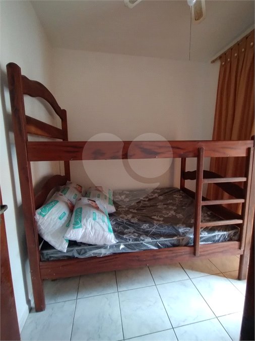 Casa à venda com 2 suítes, no condomínio Residencial Vitória Régia, Bertioga - SP