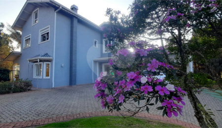 Casa à venda com 4 suítes no condomínio Suíça da Cantareira, Mairiporã - SP