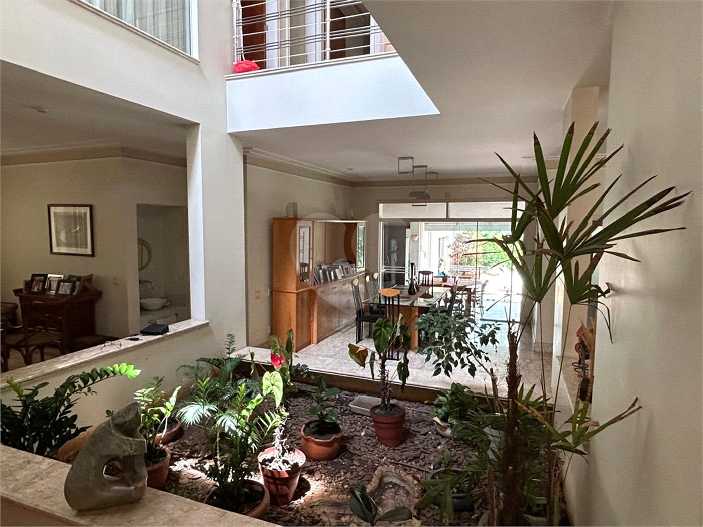 Casa à venda com 5 suítes no condomínio Residencial Bougainville, Campinas - SP