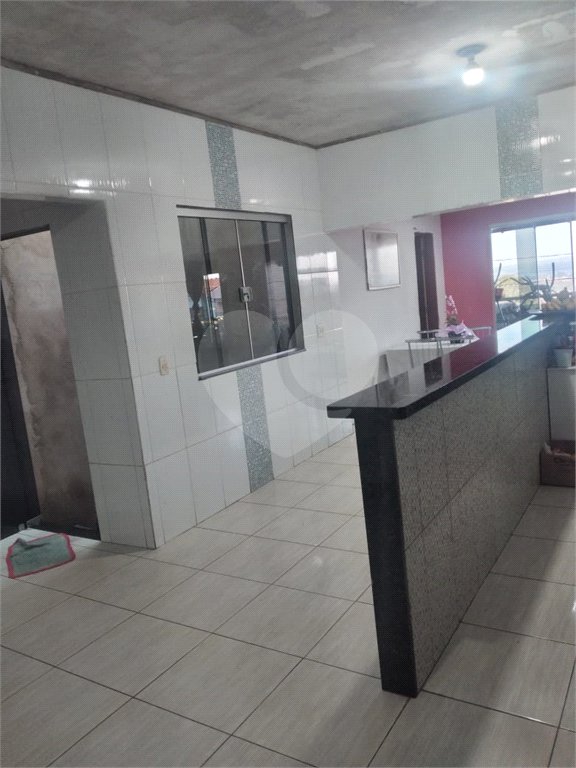 Sobrado 3 quartos e área comercial em baixo.