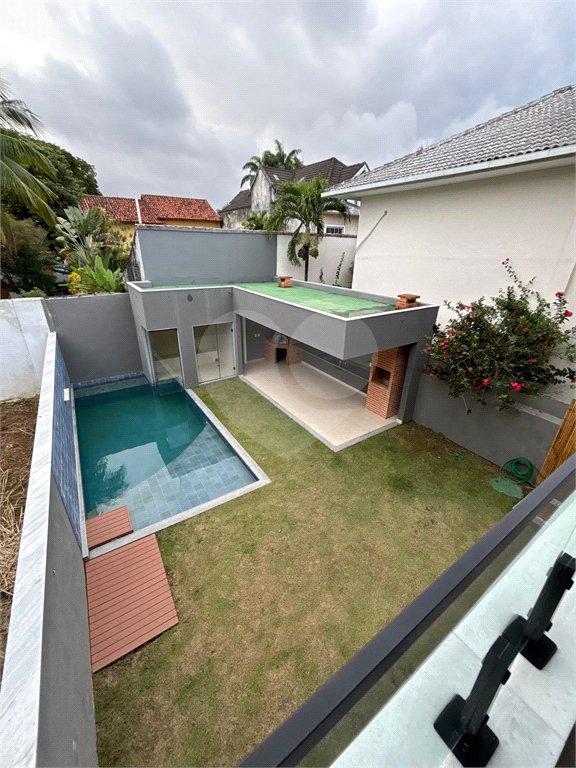 Casa à venda com 4 suítes no condomínio Riomar X, Rio de Janeiro - RJ