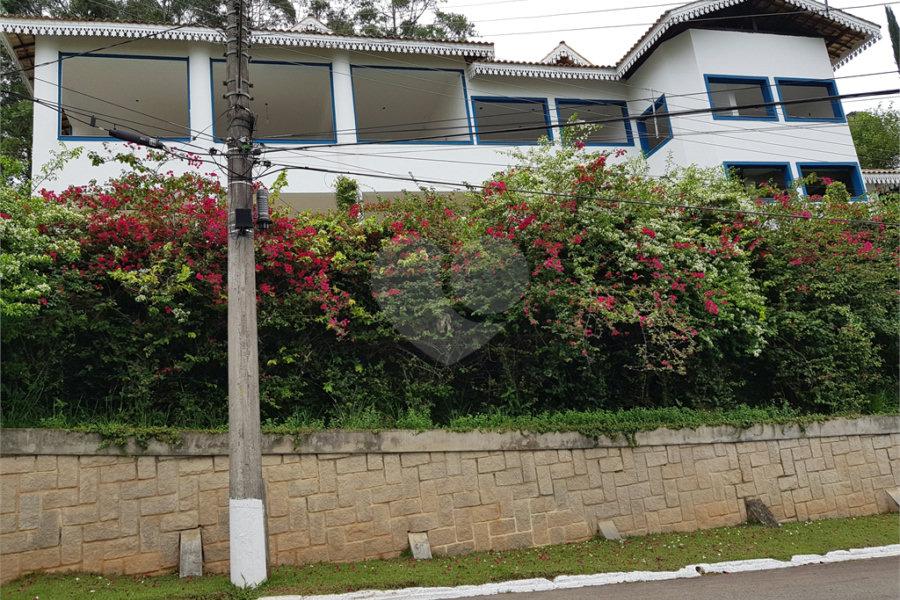 Casa à venda com 4 suítes no condomínio Suíça da Cantareira, Mairiporã - SP