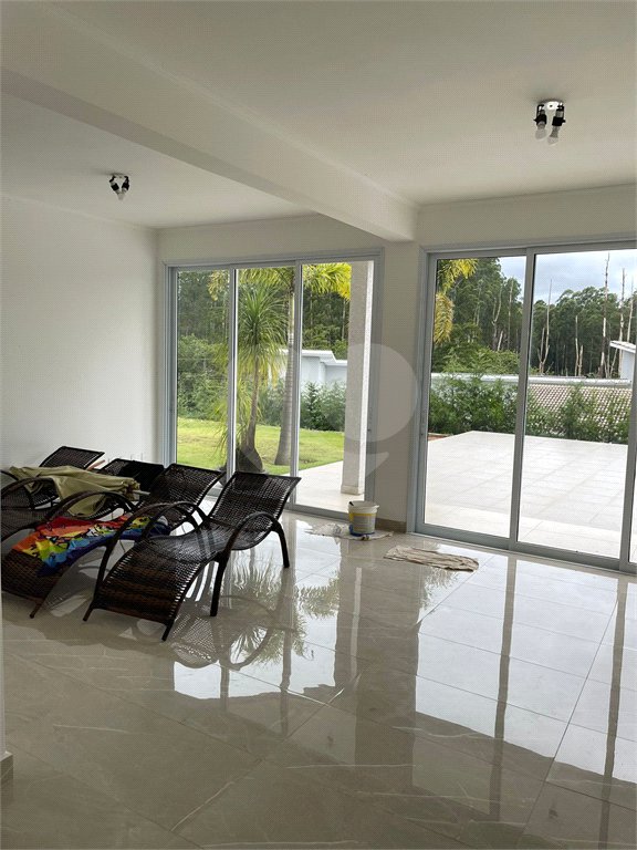 Casa à venda com 4 suítes no condomínio Jardim das Palmeiras, Bragança Paulista - SP
