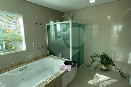 Casa à venda com 4 suítes no condomínio Haras Paineiras, Salto - SP