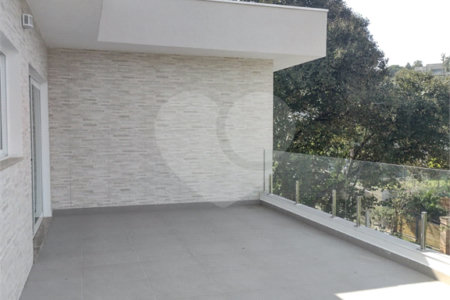Casa à venda com 4 suítes no condomínio Estância Marambaia, Vinhedo - SP