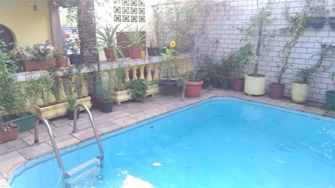 Casa com 3 dormitórios à venda, 182 m² por R$ 800.000,00 - Estuário - Santos/SP
