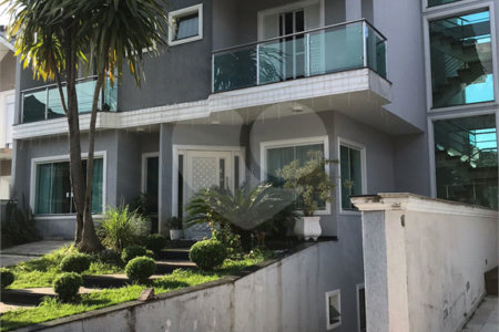 Casa à venda com 4 suítes no condomínio Aruã, Mogi das Cruzes - SP