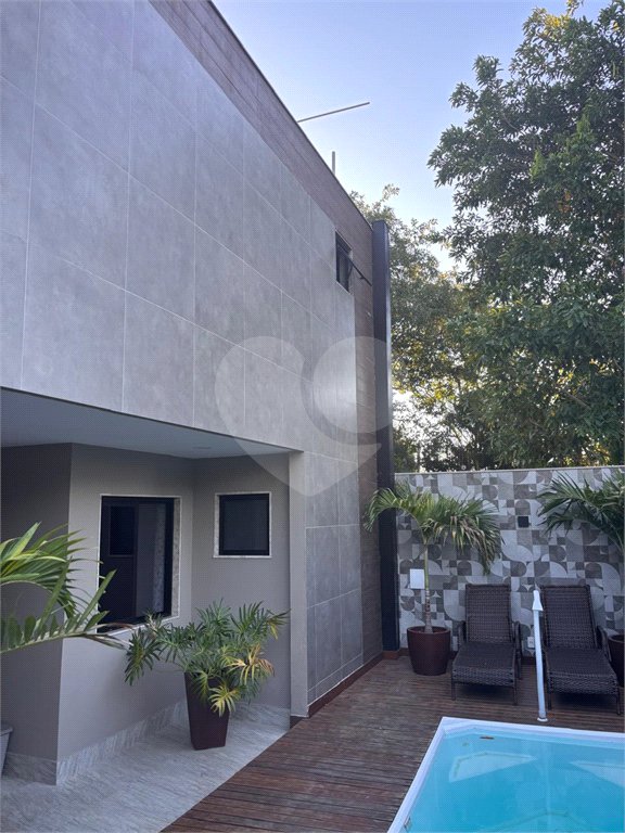 Casa à venda com 3 quartos, sendo 2 suítes, no condomínio Recanto das Palmeiras, Rio de Janeiro - RJ