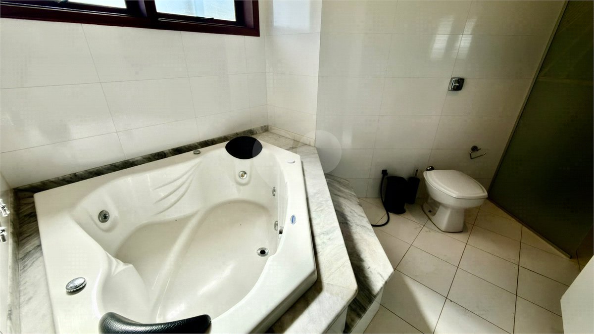Casa à venda com 4 suítes no condomínio Parque Village Castelo, Itu - SP