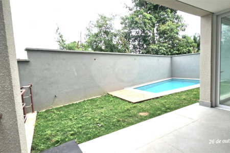 Casa à venda com 4 suítes no condomínio Vila Arese, São Paulo - SP