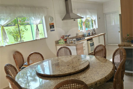 Casa à venda com 4 suítes no condomínio Bougainville, Peruíbe - SP