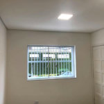 Casa com 3 dormitórios à venda, 116 m² por R$ 690.000,00 - Gonzaga - Santos/SP