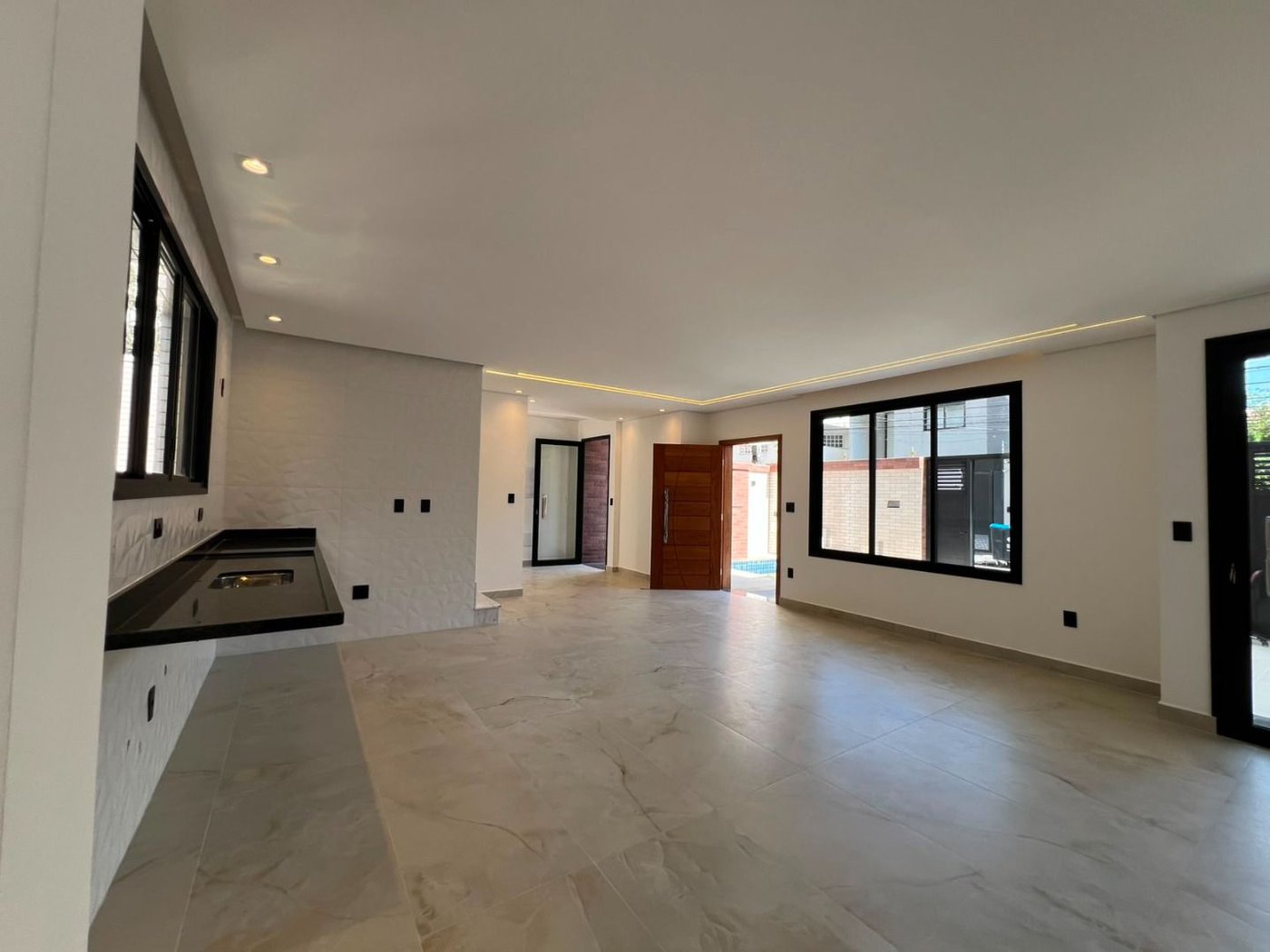 Sobrado com 4 dormitórios à venda, 234 m² por R$ 2.500.000,00 - Ponta da Praia - Santos/SP