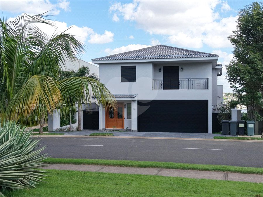 Casa à venda com 4 suítes no condomínio Alphaville Dom Pedro 3, Campinas - SP