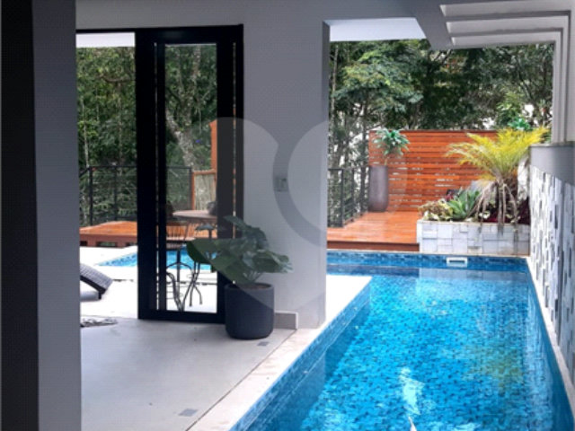 Casa à venda com 4 suítes no condomínio Jardim Itatinga, São Paulo - SP