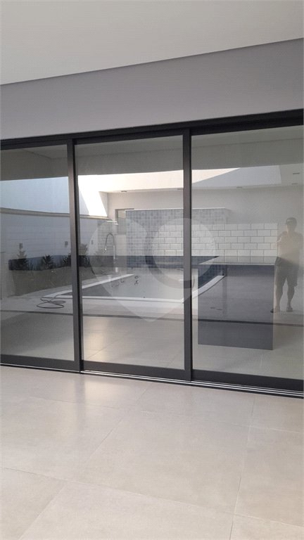 Casa à venda com 3 suítes no condomínio Jardim Laguna, Indaiatuba - SP