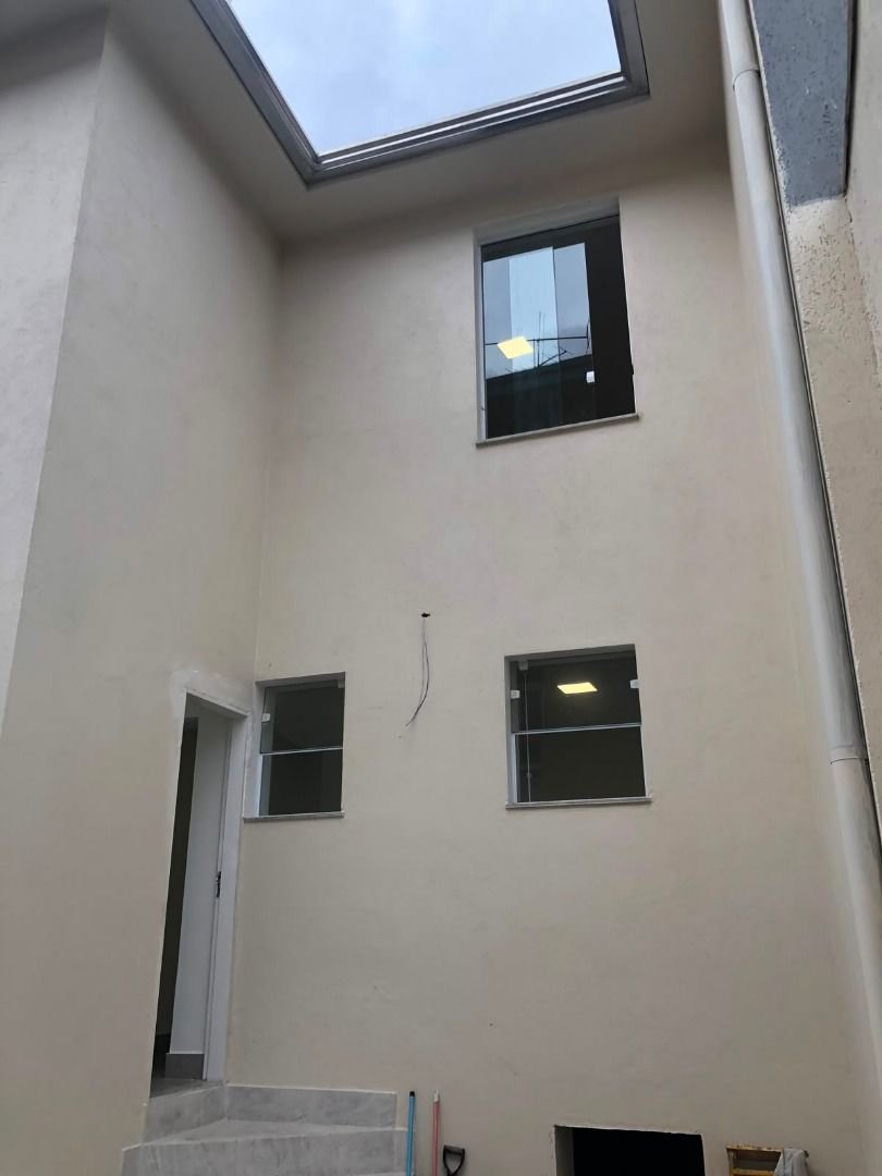 Casa com 3 dormitórios à venda, 116 m² por R$ 690.000,00 - Gonzaga - Santos/SP
